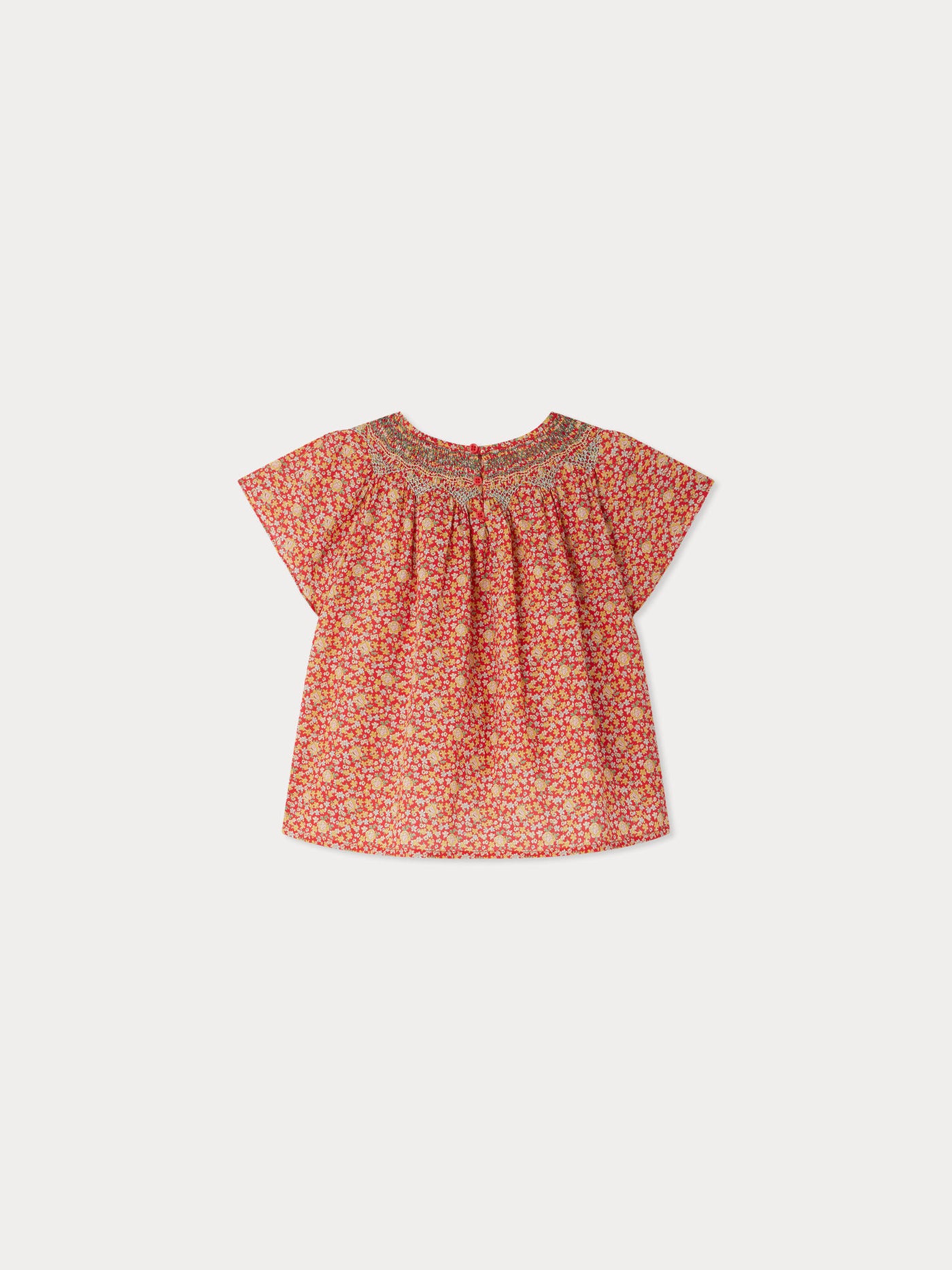 Blouse smockée et brodée en tissu Liberty Nella